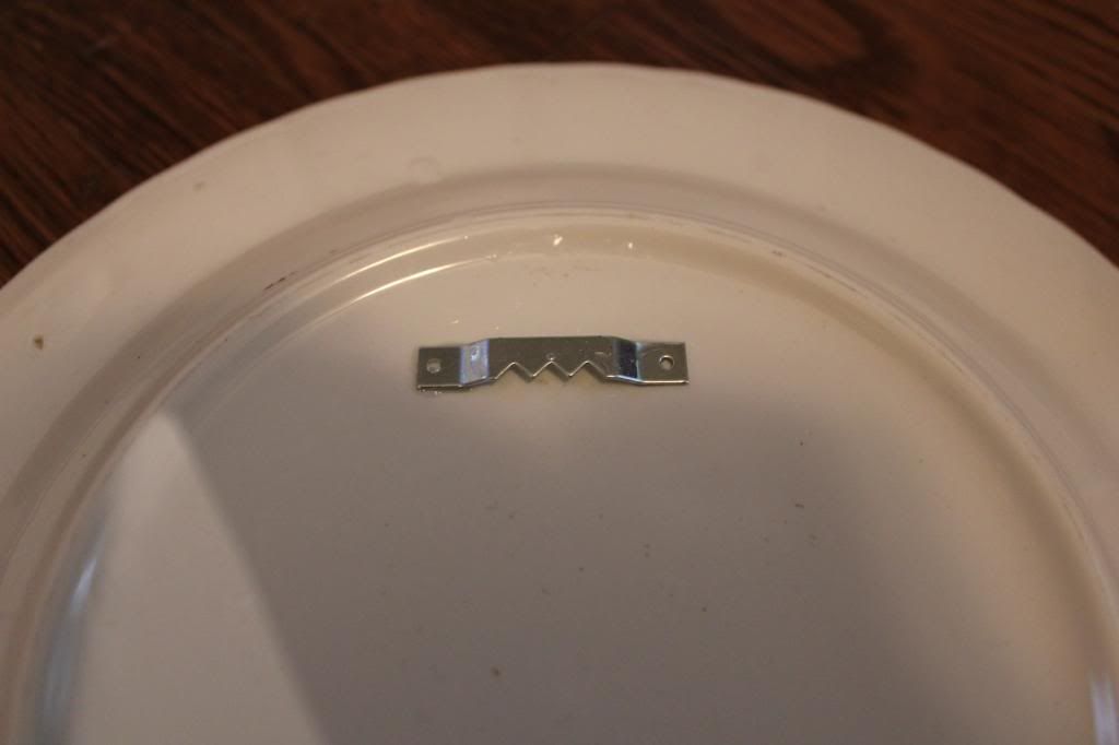 vintage plate wall without plate hangers